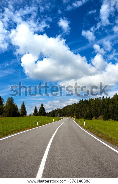 Mountain road at\
the mountains Dolomites,\
Italy\
