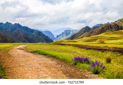 Mountain road on summer landscap - Shutterstock ID 762715789