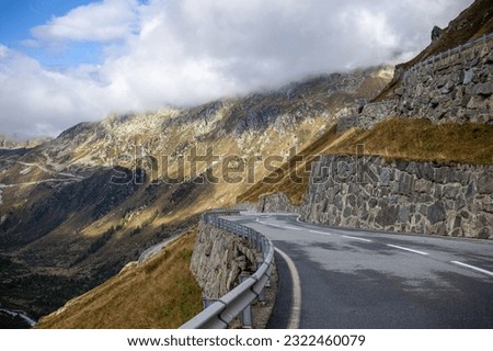Mountain road in the Swiss Alps. Landscape with a view of the Alps.
