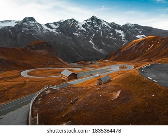 Mountain roads in autumn and snowy mountains with omami