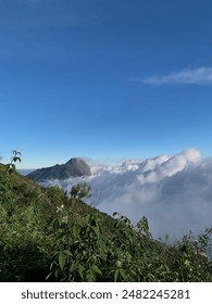 mountain side clouds summer sky