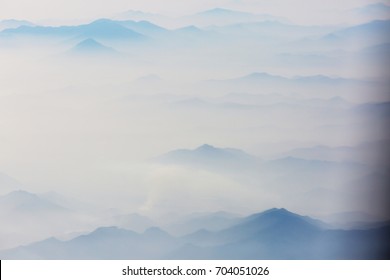Mountain silhouette - Shutterstock ID 704051026