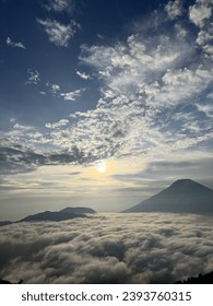 Mountain in the sky with clouds