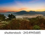 Mountain and sky scenery in the morning,Mountain valley during sunrise. Beutiful natural landsscape in the summer time.