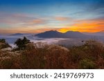 Mountain and sky scenery in the morning,Mountain valley during sunrise. Beutiful natural landsscape in the summer time.