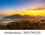 Mountain and sky scenery in the morning,Mountain valley during sunrise. Beutiful natural landsscape in the summer time.