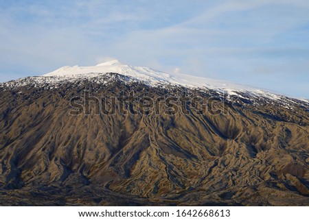 mountain of Snaefellsjokull National Park with white cap snow on peak
