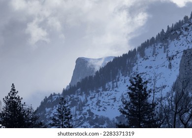 Mountain with snow and clouds