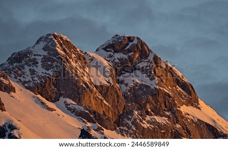 A mountain with snow on top