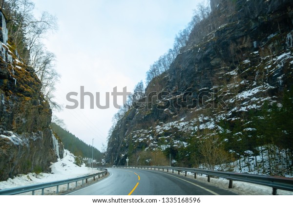 Mountain snow view. Car trip. View of Snow\
mountain, Road trip travel concept\

