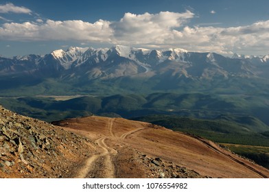 Mountain Stone Rocky Extreme Road Path On The Background Of  High Snow Glacier Ranges