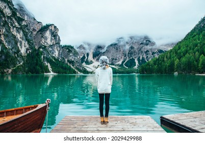 Mountain Stories. Happy Girl On A Wanderlust Vacation. Young Woman Looking At View