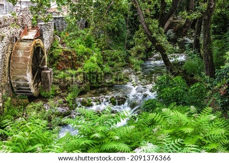 Mountain stream at the old mill wheel