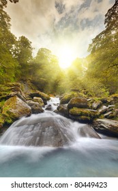 A Mountain Stream At Sunset In The Mountains Of New Zealand