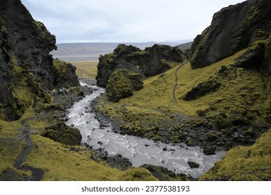 Mountain streams flow through Iceland's varied landscapes, including volcanic plains, rocky gorges and fertile valleys. This creates unique and colorful views of the waterways - Powered by Shutterstock