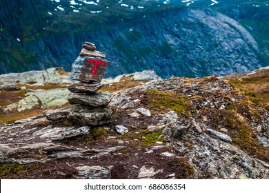 Mountain Trail Marker On A Stone Or A Rock. Marked Trail In Woods In The Summer.