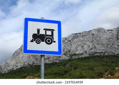 Mountain Train Stop Sign Informing About Roller Coaster Stop

