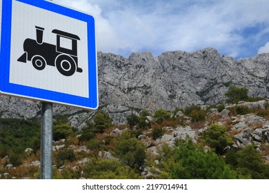 Mountain Train Stop Sign Informing About Roller Coaster Stop

