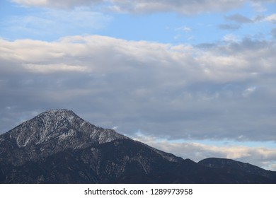 Mountain under a cloudy sky 