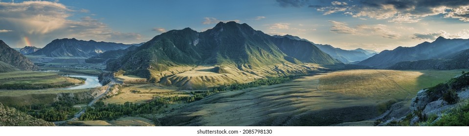 Mountain valley in contrasting evening light, large panorama, Altai - Shutterstock ID 2085798130