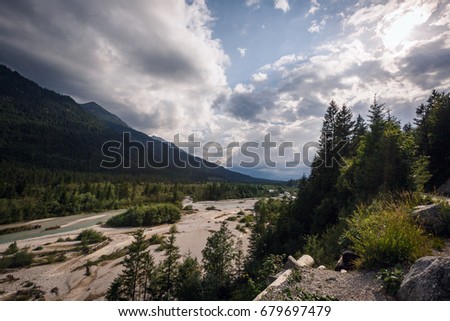 Mountain valley with dried up river bed