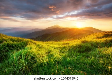 Mountain valley during sunrise. Beutiful natural landsscape in the summer time. - Shutterstock ID 1044375940