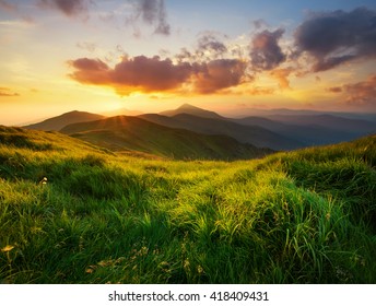 Mountain valley during sunrise. Natural summer landscape - Shutterstock ID 418409431
