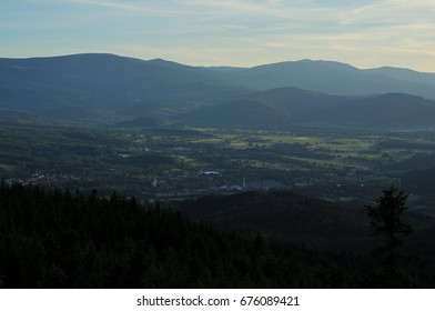Mountain valley view at sunset.
