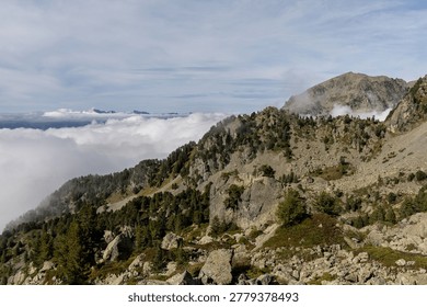 Mountain view with dramatic clouds in the Belledonne Massif, French Alps