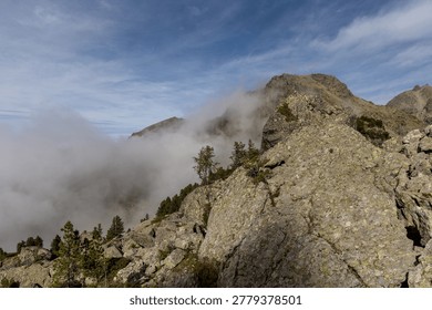 Mountain view with dramatic clouds in the Belledonne Massif, French Alps