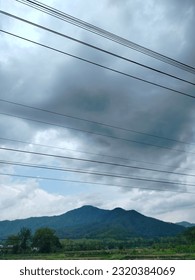 mountain. view. electric wire. cloud. 