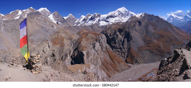 Mountain View From High Camp Towards Throng Phedi Base Camp On The Trekking Trail To Thorong La Pass, Annapurna Circuit, Conservation Area, Himalayas, Nepal, Asia. Horizontal Panorama.