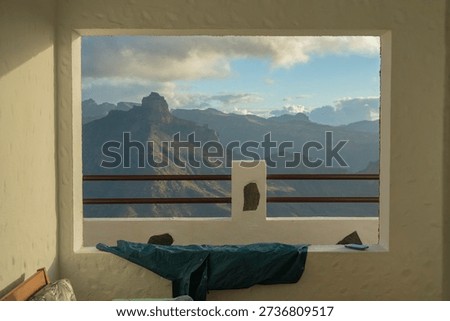Mountain view through window in minimalist interior