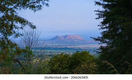 Mountain view with trees in the foreground