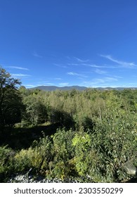 Mountain View with Trees and Sky