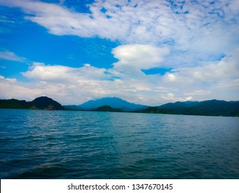 mountain views and blue sky from the ocean