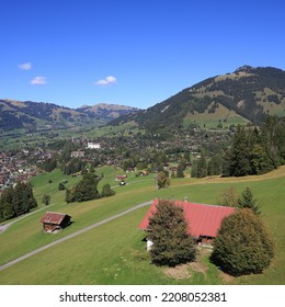 Mountain Village And Holiday Resort Gstaad In Late Summer.