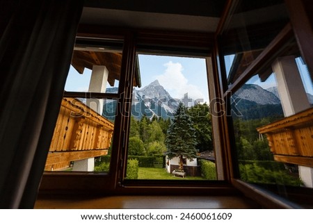 Similar – Foto Bild Young woman on the balcony who enjoys the view of the mountains