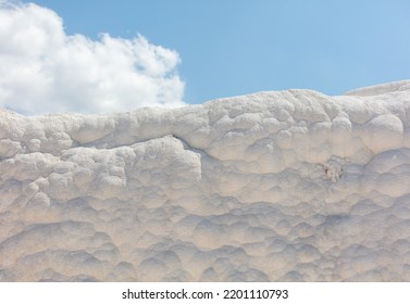 A Mountain Of White Volcanic Limestone Rock Against A Blue Sky. Nature