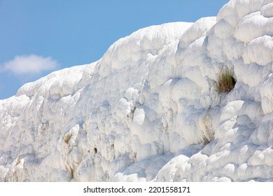 A Mountain Of White Volcanic Limestone Rock Against A Blue Sky. Nature