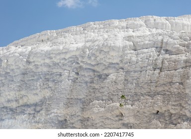 A Mountain Of White Volcanic Limestone Rock Against A Blue Sky. Nature