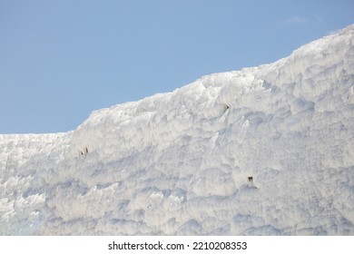 A Mountain Of White Volcanic Limestone Rock Against A Blue Sky. Nature