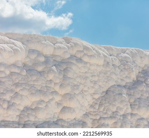 A Mountain Of White Volcanic Limestone Rock Against A Blue Sky. Nature