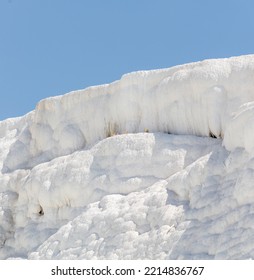 A Mountain Of White Volcanic Limestone Rock Against A Blue Sky. Nature