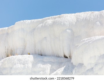 A Mountain Of White Volcanic Limestone Rock Against A Blue Sky. Nature