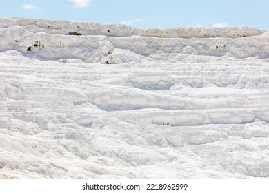 A Mountain Of White Volcanic Limestone Rock Against A Blue Sky. Nature