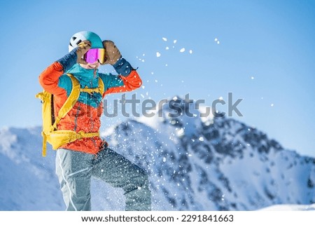 Mountaineer backcountry ski walking ski alpinist in the mountains. Ski touring in alpine landscape with snowy trees. Adventure winter sport. Tatras, slovakia
