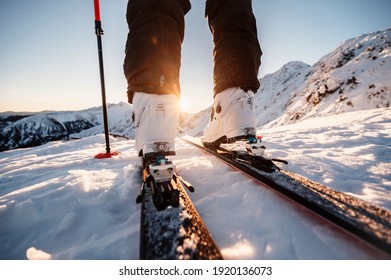 Mountaineer Backcountry Ski Walking In The Mountains. Ski Touring In High Alpine Landscape. Adventure Winter Extreme Sport. Detail Boots.