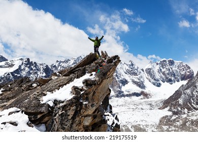 Mountaineer At The Top Of The World, Himalayas, Mount Everest. Copy Space