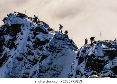 Mountaineers climbing to the highest Austrian mountain Grossglockner.